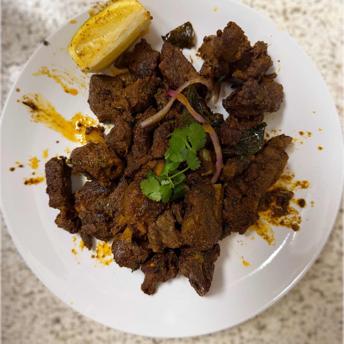 Nethimamsam Roast (Ghee roast goat)